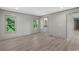 Spacious bedroom features two windows and an ensuite bathroom, offering both comfort and convenience at 1126 Amanda Lane, Loris, SC 29569
