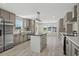 Open concept kitchen features a large island, stainless appliances and lots of natural light at 1126 Amanda Lane, Loris, SC 29569