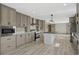 Bright kitchen features an island, stainless appliances, and ample cabinet space at 1126 Amanda Lane, Loris, SC 29569