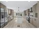 Modern kitchen with stainless appliances, center island and ample cabinet space at 1126 Amanda Lane, Loris, SC 29569