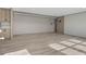 Bright living room features modern flooring, neutral walls, and ample natural light at 1126 Amanda Lane, Loris, SC 29569