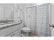 Bright bathroom features granite countertop, modern vanity, and shower at 116 Kingsbury Loop # C, Conway, SC 29526