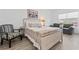 Comfortable bedroom featuring a queen bed and sitting area with natural light at 116 Kingsbury Loop # C, Conway, SC 29526