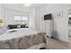 Bedroom with queen bed, sitting area and dresser with television at 116 Kingsbury Loop # C, Conway, SC 29526
