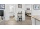 Hallway showing access to bedroom, bathroom, and a stylish bar cart with sleek, modern design at 116 Kingsbury Loop # C, Conway, SC 29526