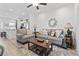 Inviting living room featuring cozy seating and a view into the modern kitchen at 116 Kingsbury Loop # C, Conway, SC 29526
