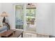 View from living room to screened in porch/sunroom with ceiling fan at 116 Kingsbury Loop # C, Conway, SC 29526