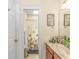 Practical bathroom layout featuring a combination tub and shower, a sink, and toilet, optimizing space at 1176 Old Plantation Dr., Pawleys Island, SC 29585