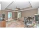 Office room with ceiling fan, a large desk, printer and a decorative rug at 1176 Old Plantation Dr., Pawleys Island, SC 29585