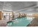 Inviting indoor pool area with plenty of seating and natural light creating a relaxing atmosphere at 1200 N Ocean Blvd. # 211, Myrtle Beach, SC 29577