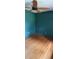 This spacious bedroom with wood floors has a ceiling fan at 1206 French Rd, Mullins, SC 29574