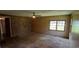 This bedroom has an accent wall and lots of natural lighting at 1206 French Rd, Mullins, SC 29574