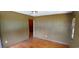 Empty bedroom with wood floors, ceiling fan, neutral walls and natural light at 1206 French Rd, Mullins, SC 29574