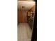 The laundry room has a linoleum floor and wood paneling at 1206 French Rd, Mullins, SC 29574