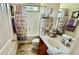 Full bathroom with shower/tub combo and vanity with great lighting at 1300 Ruddy Ct., Conway, SC 29527