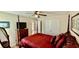 Spacious bedroom featuring a four-poster bed, ceiling fan, and closet space at 1300 Ruddy Ct., Conway, SC 29527