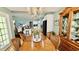 Elegant dining area features a chandelier and is seamlessly connected to the kitchen and living area at 1300 Ruddy Ct., Conway, SC 29527