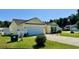 A charming home with a two-car garage and well-kept lawn and landscaping in a quiet neighborhood at 1300 Ruddy Ct., Conway, SC 29527