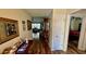 Inviting hallway that leads to a cozy living room and a bedroom at 1300 Ruddy Ct., Conway, SC 29527