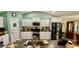 Well-equipped kitchen features stainless steel appliances, white cabinets, and ample countertop space for meal preparation at 1300 Ruddy Ct., Conway, SC 29527