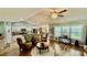 Open-concept living area connects a well-appointed kitchen, dining area, and a cozy living space at 1300 Ruddy Ct., Conway, SC 29527