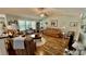 Cozy living room features hardwood floors, high ceilings, and plenty of natural light at 1300 Ruddy Ct., Conway, SC 29527