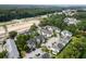 Aerial view of townhouses highlighting ample parking, landscaping and construction near the property at 134 Scotch Broom Dr. # K - 201, Little River, SC 29566