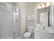 Clean bathroom with glass-enclosed shower, white vanity, and modern fixtures at 134 Scotch Broom Dr. # K - 201, Little River, SC 29566