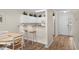 Bright kitchen and breakfast nook area with white cabinets and modern appliances, perfect for entertaining at 134 Scotch Broom Dr. # K - 201, Little River, SC 29566