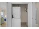 Convenient laundry closet with stacked washer and dryer unit with bi-fold closet doors at 134 Scotch Broom Dr. # K - 201, Little River, SC 29566