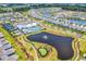 Stunning aerial view showcasing the community amenities, including a pool and clubhouse at 1360 Littleleaf Loop, North Myrtle Beach, SC 29582