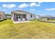 A spacious backyard with a screened in porch at 1360 Littleleaf Loop, North Myrtle Beach, SC 29582