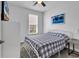 Cozy bedroom with natural light featuring a twin bed, side table and decorative artwork at 1360 Littleleaf Loop, North Myrtle Beach, SC 29582