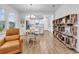 Open-concept dining area with natural light and views of kitchen at 1360 Littleleaf Loop, North Myrtle Beach, SC 29582