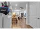 Open-concept living area with modern decor, hardwood floors, and bright lighting at 1360 Littleleaf Loop, North Myrtle Beach, SC 29582