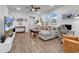 Cozy living room featuring hardwood flooring and comfortable seating area, home office, and desk at 1360 Littleleaf Loop, North Myrtle Beach, SC 29582