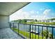 Take in beautiful views of the water from this tiled balcony with metal railings at 1425 Teague Rd. # 203, Myrtle Beach, SC 29577