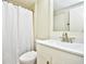 Bright bathroom with a shower/tub combination and a white single sink vanity at 1425 Teague Rd. # 203, Myrtle Beach, SC 29577