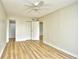 Bedroom boasts wood floors, ample closet space, and a neutral color palette at 1425 Teague Rd. # 203, Myrtle Beach, SC 29577