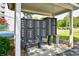 Exterior view of a community mailboxes with individual unit numbers and a covered shelter at 1425 Teague Rd. # 203, Myrtle Beach, SC 29577