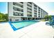 Enjoy a community pool right outside this condo building at 1425 Teague Rd. # 203, Myrtle Beach, SC 29577