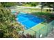 Community tennis court with flowering trees at 1425 Teague Rd. # 203, Myrtle Beach, SC 29577