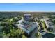 Aerial view of Summerhouse condos with pool, landscaping, and parking at 14290 Ocean Hwy. # 407, Pawleys Island, SC 29585