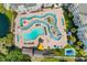 Bird's eye view of the complex featuring a winding pool, playground, and grassy areas at 14290 Ocean Hwy. # 407, Pawleys Island, SC 29585