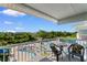 Enjoy the outdoors on this unit's covered balcony that overlooks the pool and surrounding green spaces at 14290 Ocean Hwy. # 407, Pawleys Island, SC 29585