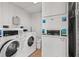Community laundry room with multiple washers and dryers for resident convenience at 14290 Ocean Hwy. # 407, Pawleys Island, SC 29585