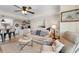 Inviting living room blending seamlessly with the kitchen, providing an ideal space for relaxing and entertaining at 14290 Ocean Hwy. # 407, Pawleys Island, SC 29585