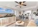 Open-concept living room offering a seamless transition to the kitchen, creating a perfect space for entertaining guests at 14290 Ocean Hwy. # 407, Pawleys Island, SC 29585