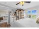 Bright main bedroom with a window view, and ample storage, with easy access to living room at 14290 Ocean Hwy. # 407, Pawleys Island, SC 29585
