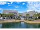 The Deck restaurant with solar panels and a view of the pond and outdoor seating at 14290 Ocean Hwy. # 407, Pawleys Island, SC 29585